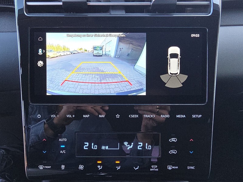 Fahrzeugabbildung TUCSON Navi Rückfahrkamera Sitzheizung Bild 13 von 15