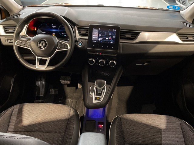 Inside Captur Híbrido Enchufable  Naranja Atakama con 